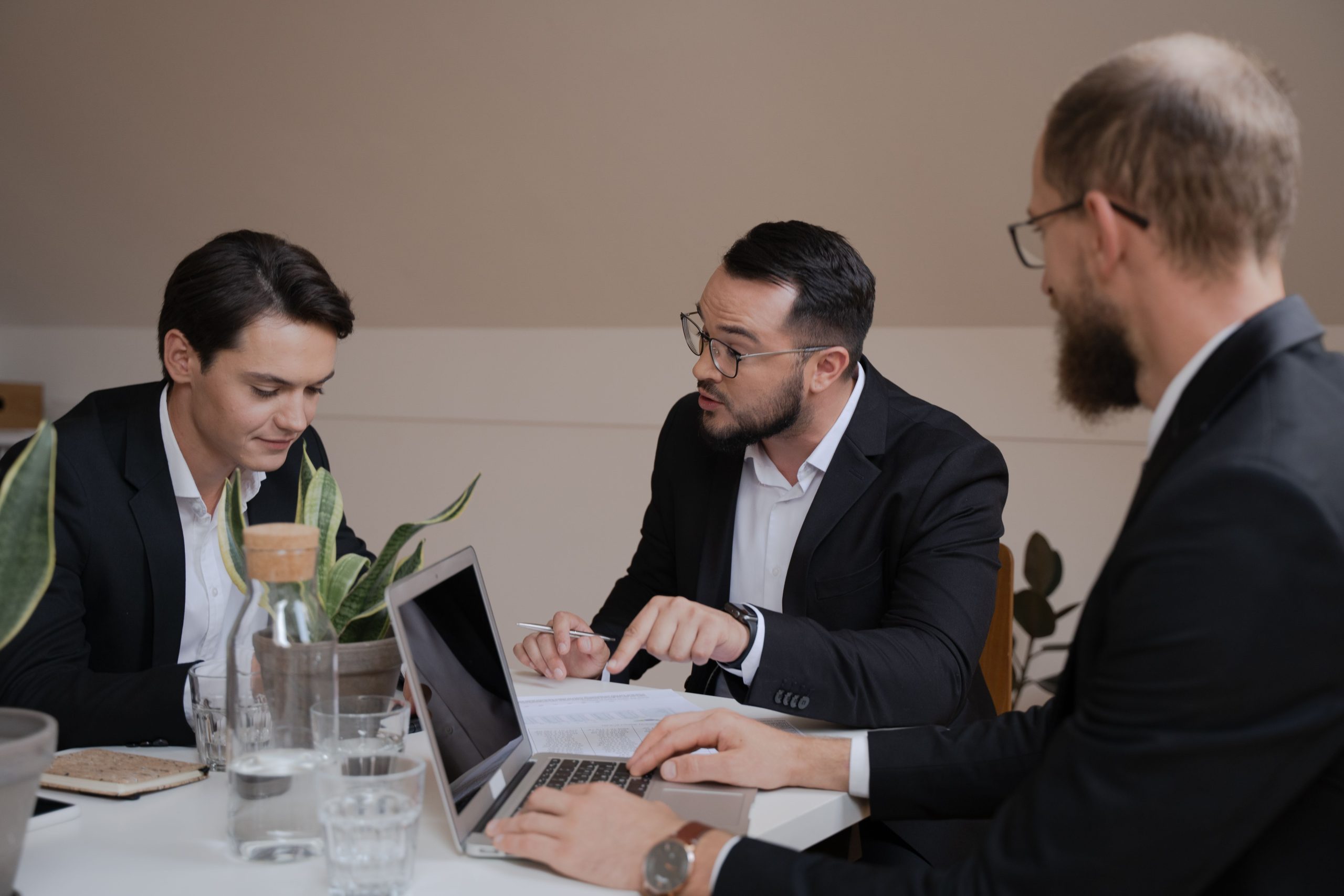 Business owner reviewing entity paperwork with an accountant